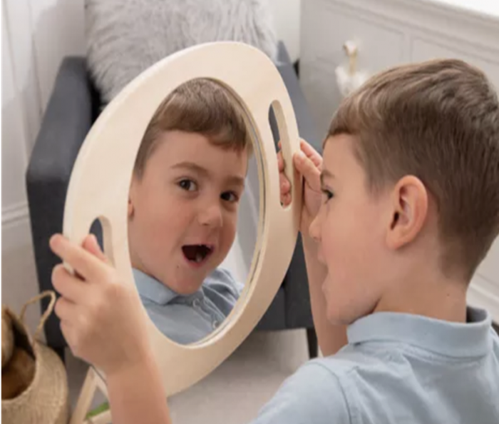 tickit Hand Held Wooden Mirror – A lightweight, easy-to-hold wooden framed mirror designed for hands-on sensory play, self-observation, role play, and learning.