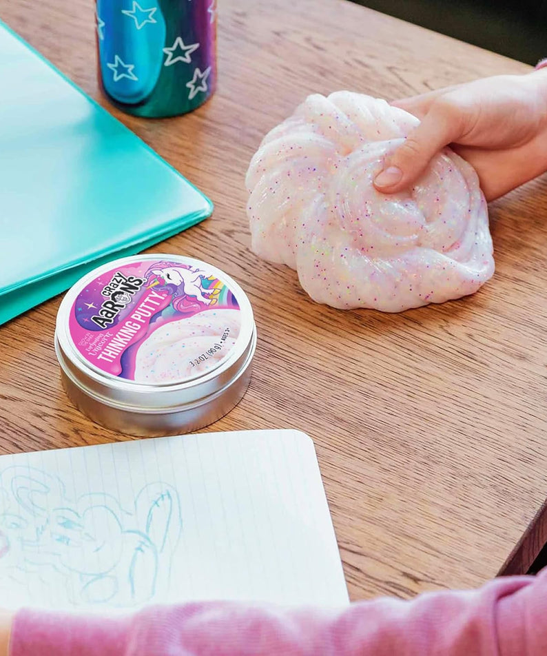 Crazy Aaron's Glow In The Dark Enchanting Unicorn Thinking Putty, 4" Tin with 90g of Non-Toxic Sensory Play Putty which Never Dries Out, Soft Textured Creative Fidget Toy for Boys and Girls Ages 3Y+