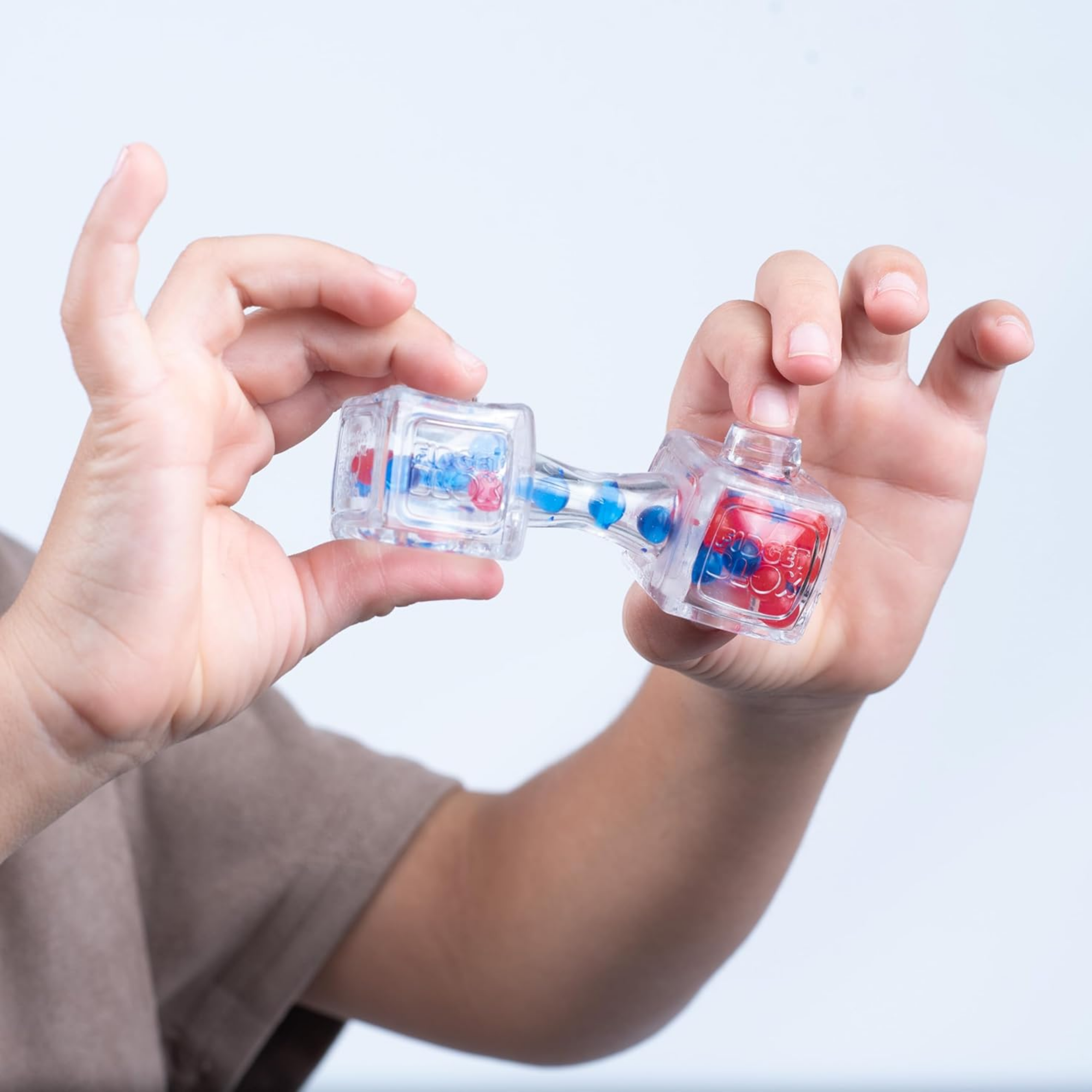 Goliath Fidget Blox, Sound Focused Sensory Squeeze & Play Ball Sorting Fidget Toy, Anxiety & Stress Relief Calming Therapy Desk Toy for Adults and Children, Red & Blue Beads