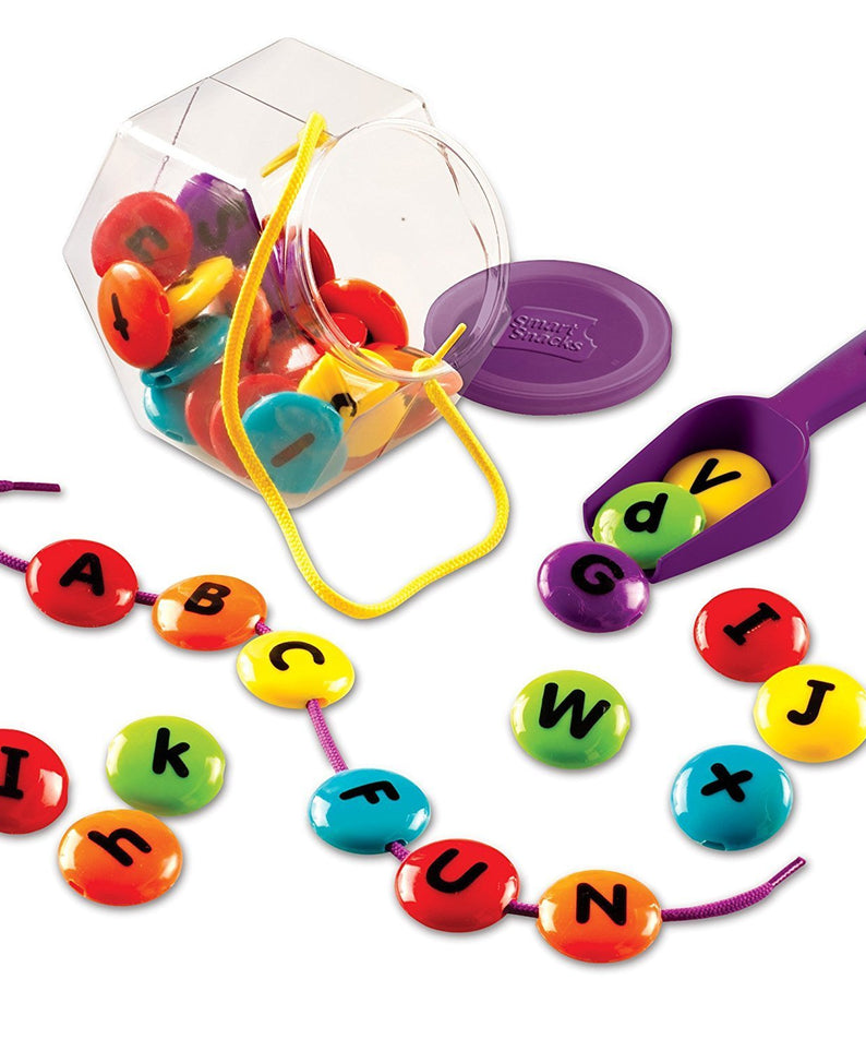 Learning Resources Smart Snacks ABC Lacing Sweets, Alphabet Beads for Fine Motor Skills and Early Literacy, Preschool Learning Toy with Storage Tub, Ages 3+